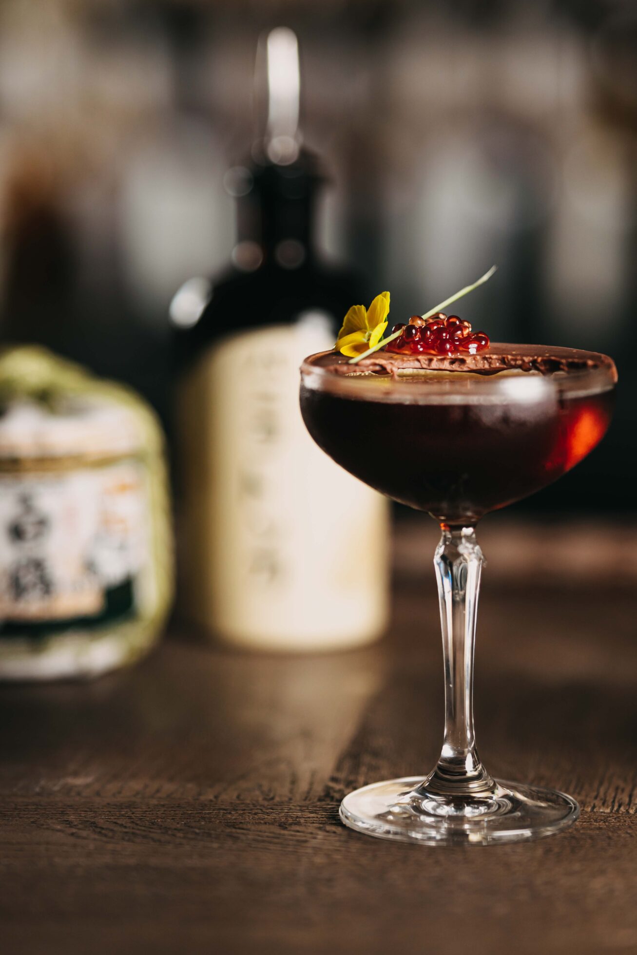 Clap Bar is a sensory wonderland that transports you to the vibrant nightlife of Tokyo.