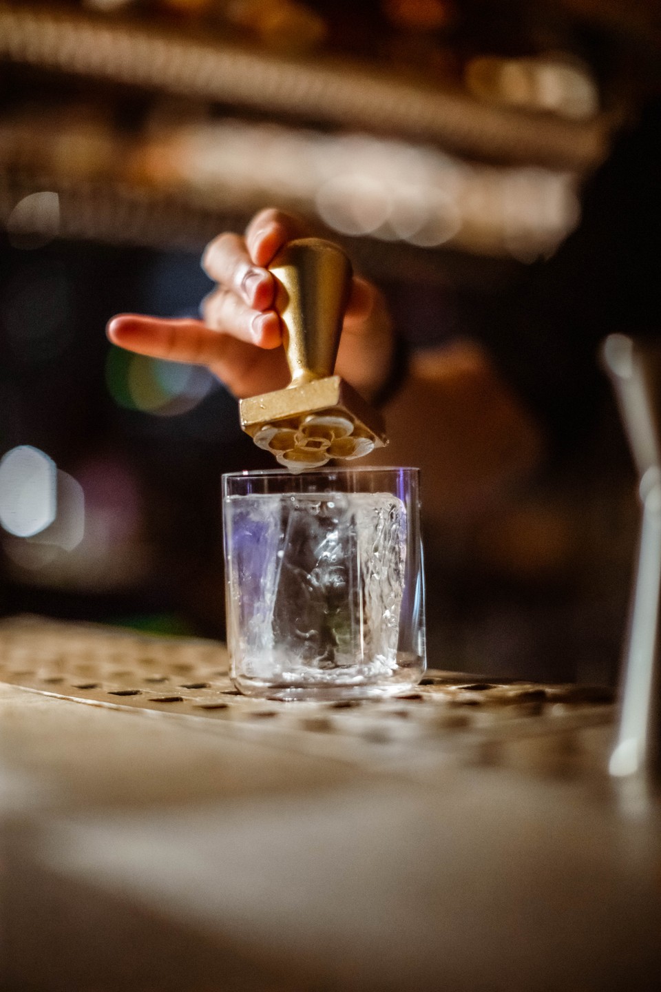 a person preparing a drink at CLAP london