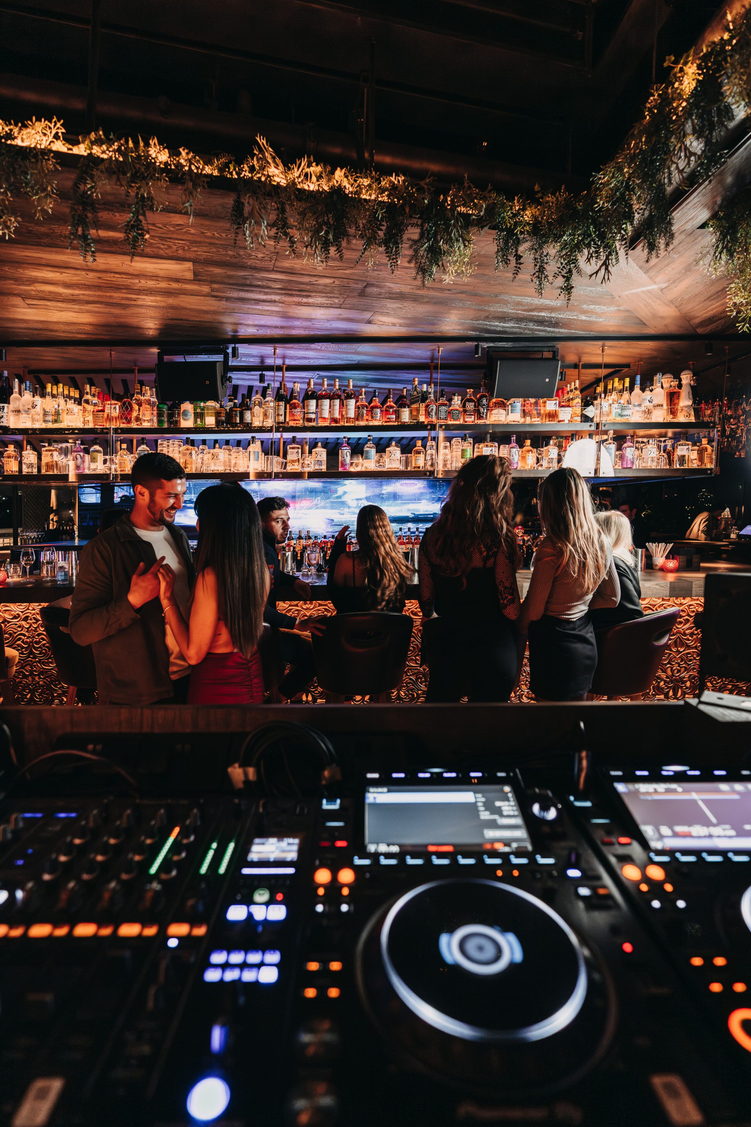 People enjoying at CLAP London bar